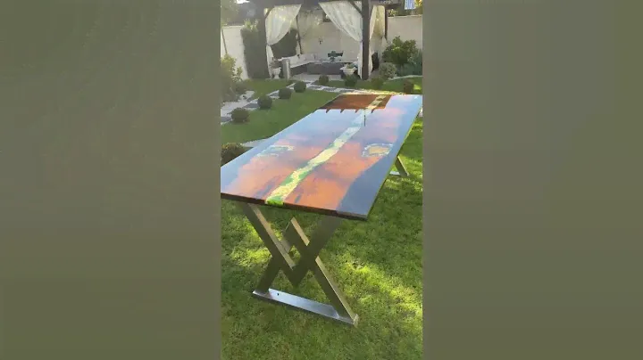 fossilized wood table decorated with stones, stabilized lichens, catalpa leaves and epoxy resin